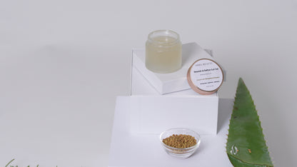 Asha Belle Beauty Nourish & Define Curl Gel styled with botanical ingredients on neutral background