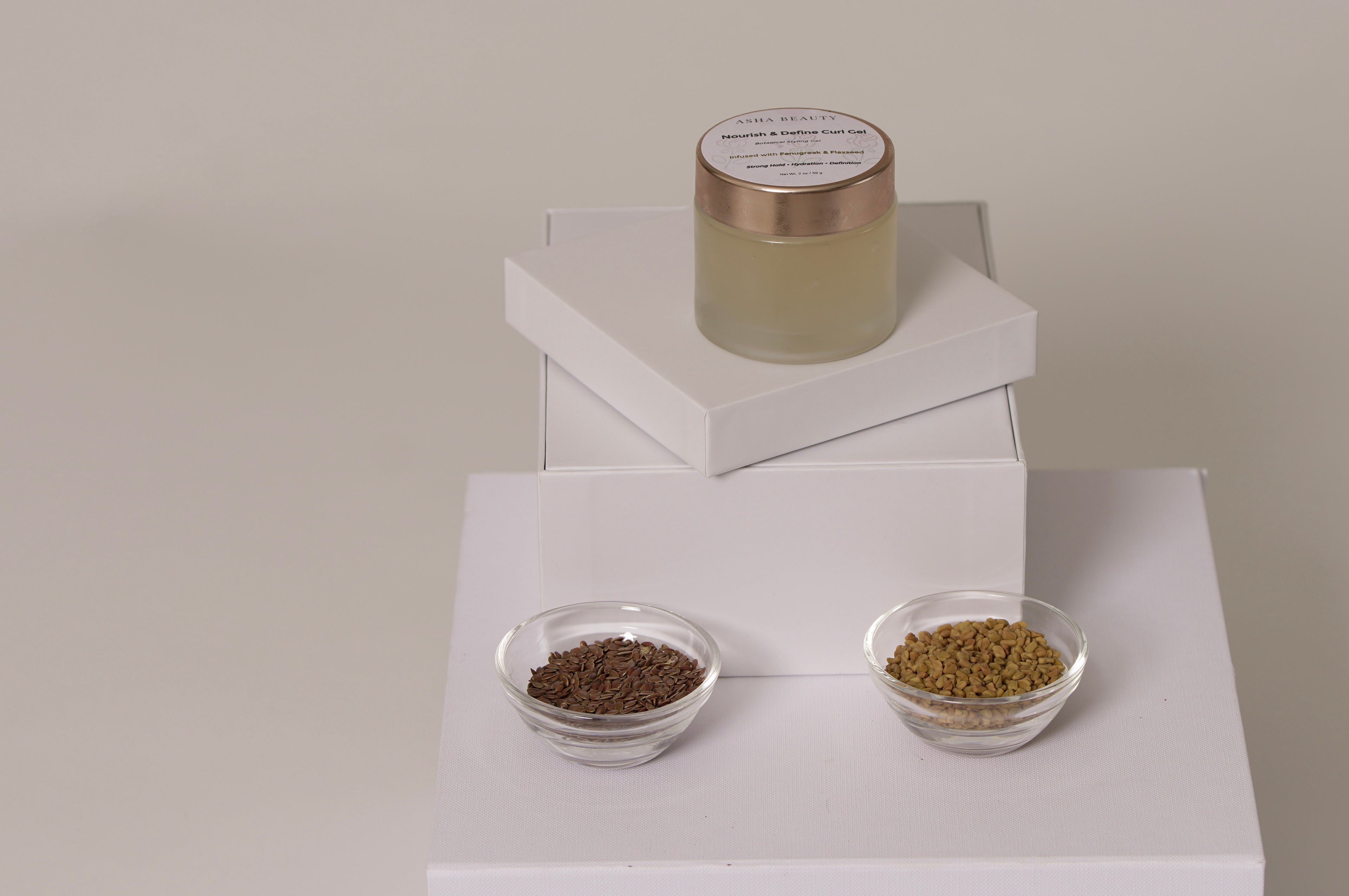 Asha Belle Beauty Nourish & Define Curl Gel jar with rose gold lid on white background